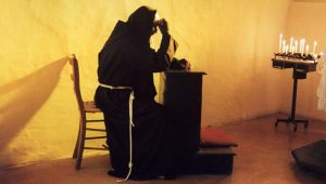 Padre Pio em oração